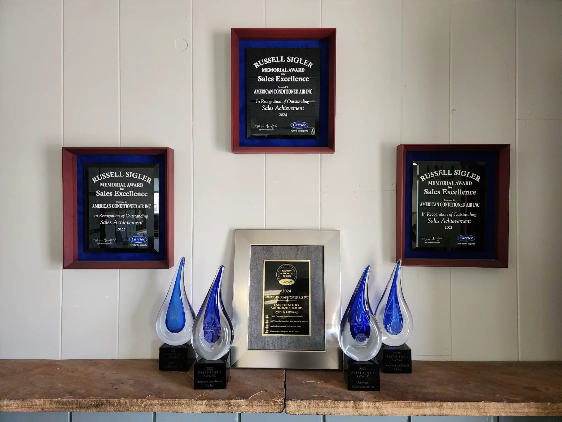 American Conditioned Air Carrier President's Award trophies and Russell Sigler Sales Excellence plaques